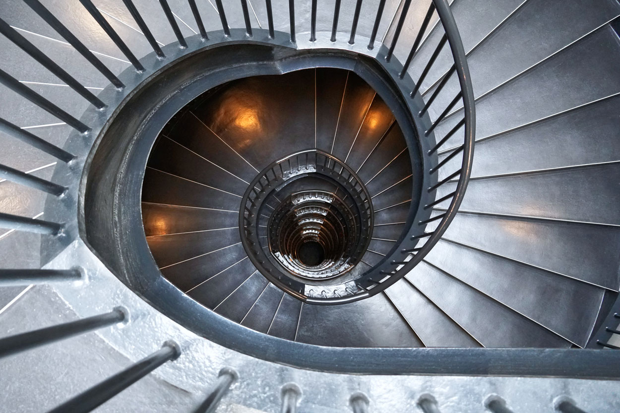 one of the natural cures for anxiety is hypnotherapy. a staircase representing the hypnosis state